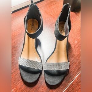 Woman’s black heels